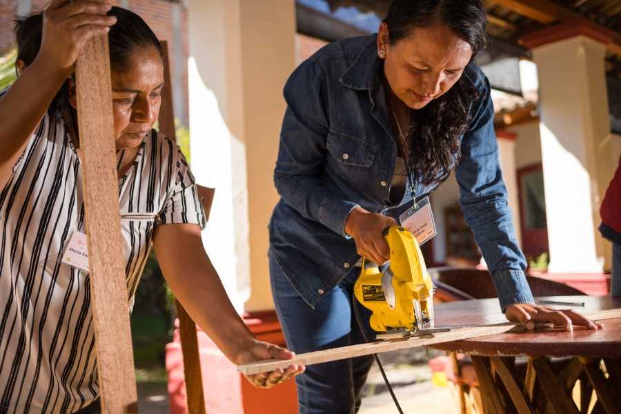 Woman sawing